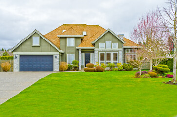 Houses in suburb at Summer in the north America. Luxury houses with nice landscape.