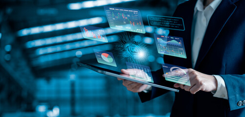 Businesswoman working with business data, finance, marketing report, Big Data Analytics technology, Processing Complexity information flow on virtual screen, machine learning, artificial intelligence.