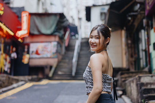 Smiling Woman in Urban Street