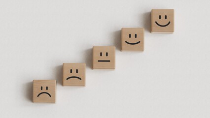 Wooden blocks with happy face smile face symbol symbol on pink background, good feedback rating and positive customer review, experience, satisfaction survey, world mental health day concept
