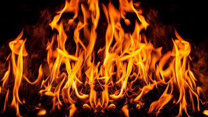 Fire flame background. Fire flames. Campfire texture. Flaming bonfire. Fire wallpaper. Bonfire background with copy space. Blaze fire flame texture background.