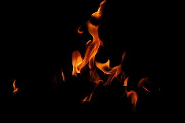 Texture of fire on black background. Abstract fire flame background. Large burning fire. Blaze fire flame texture background.