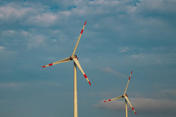 Wind turbines Generating Electricity. Wind power technology. Wind generator power. Green...
