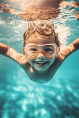 Fototapeta premium Joyful child enjoying a swim in the pool wearing colorful goggles and having fun