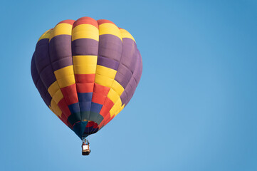 Fototapeta premium Fancy hot air balloon in flight against the sky.