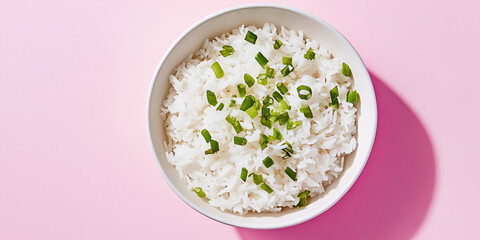 Fresh White Rice Topped with Scallions in a Clean Bowl