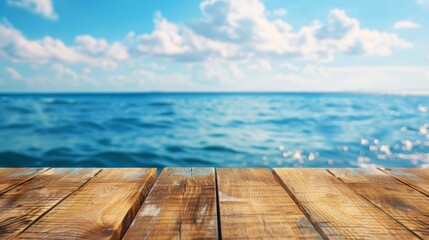 Wooden table top on blurred summer blue sea and sky background. Copy space