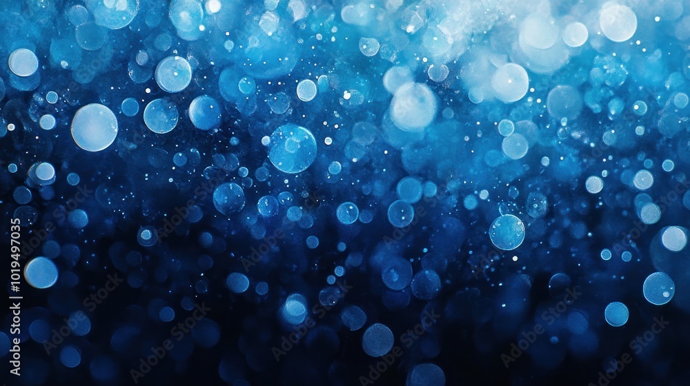 Poster a blurred background of blue bokeh lights, creating a dreamy and abstract atmosphere.