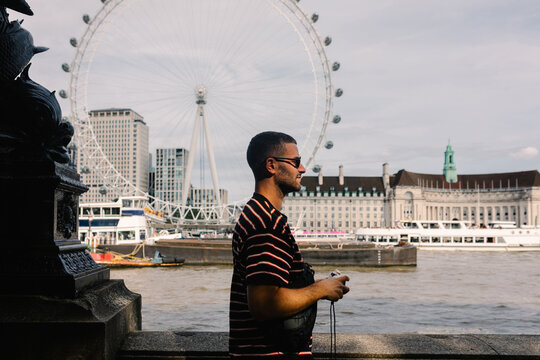 A hobbyist photographer snaps photos of the London Eye in the UK
