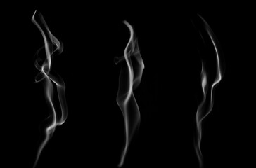 Isolated white fog or smoke effect on black background. White clouds. Fog or smoke background. Vapor. Illustration showing various textures and densities of smoke. © WICHAI