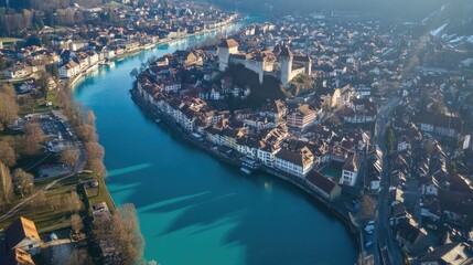 Fototapeta premium Aerial View of Historic Town by Serene River