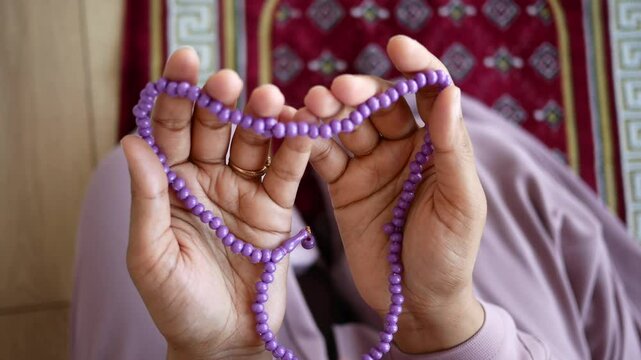 Close up of muslim women hand praying at ramadan 