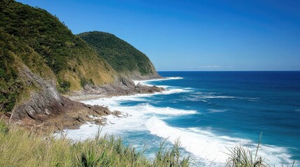 Fototapeta premium Serene Coastal Landscape with Blue Ocean Waves