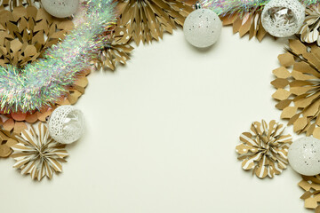 Christmas background in eco-style.  White background with Christmas decorations made of kraft paper and cardboard.