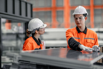 Factory metal workers install solar panels, cut costs, earn carbon credits, combat climate change.