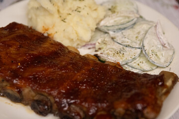 BBQ Ribs with Mashed Potatoes with cucumber salad