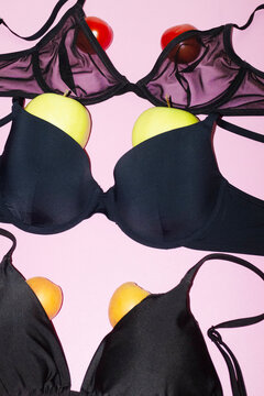 Bikinis & bras with fruits as boobs representing diversity of breasts
