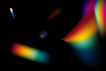 Dynamic lens flare and rainbow prism effect on transparent background. Rainbow light rays, lens flare, reflection effect from crystal, glass or gem. Blur colorful rainbow crystal light leaks.