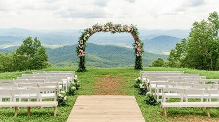 A scenic outdoor wedding setup with chairs, an arch, and mountain views.