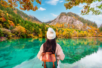 Beautiful autumn scenic view at five flower lake in jiuzhaigou national park
