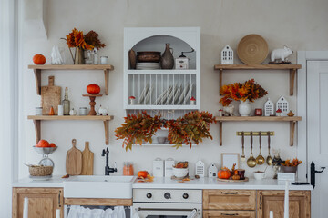 Cozy autumn kitchen with seasonal decor and harvest-themed accents in a bright setting