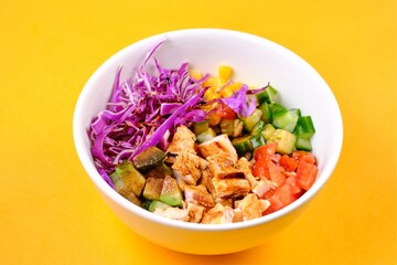 Chicken Salad Bowl on a Yellow Background