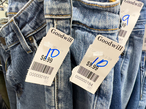 Goodwill second-hand thrift store price tags on jeans.