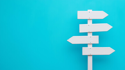 A simple white signpost with multiple directional arrows against a bright blue background.