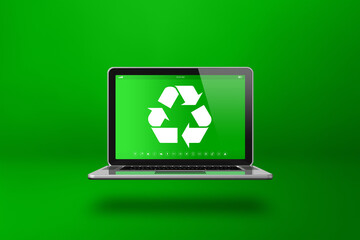 Laptop computer with a recycling symbol on screen. environmental conservation concept