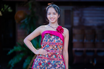 Fashionable portrait beautiful girl. Hill tribe clothing has been redesigned to suit the current era and modern city people's lifestyle.