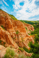 Red rocky slopes Rapa Rosie is a protected geological and floristic reservation area near Sebes alba in Romania