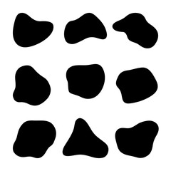 A set of abstract black spots of spilled liquid, vector. Silhouette of a flat dropped drop of ink isolated on a white background. Decorative element background for design with text, decoration.