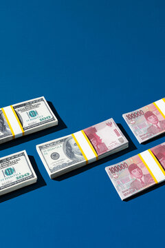 One hundred US dollars to Indonesian rupiah, money exchange concept