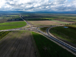 Moldova highway in Romania. A7 highway road from Buzau to Focsani cities. Aerial photo with this high speed road before inauguration. Transportation industry in Romania.