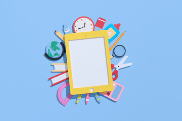 Colorful paper art of school supplies apple on a blue background