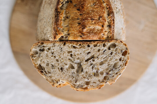 Cross section of artisanal bread with seeds inside