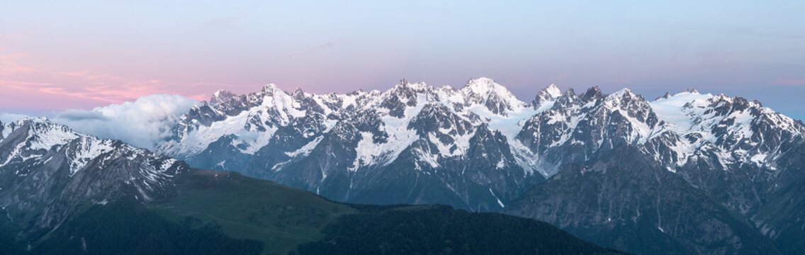 Mont Blanc Massif at sunrise from Switzerland at high altitude. vt