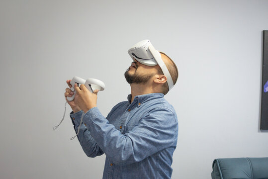 Man using VR headset indoors