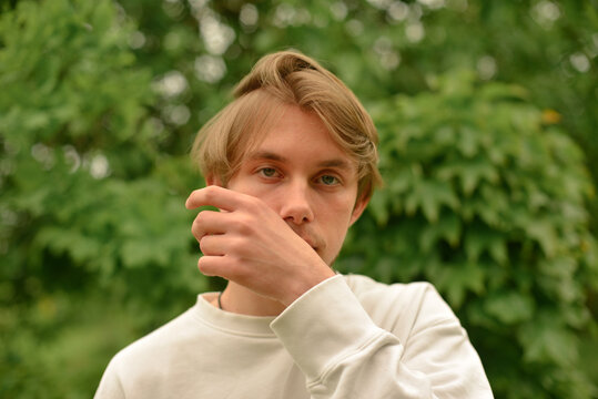 A confused male portrait outdoor