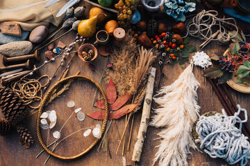 Natural elements and decorative items on rustic tabletop