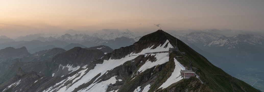 Mountain Hut on a knife edge at sunrise. 
 Breinz.  Switzerland. vt