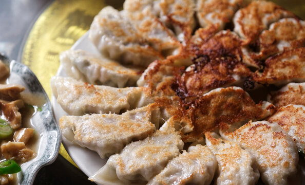 Closeup of delicious food, fried dumplings with chive and pork filling