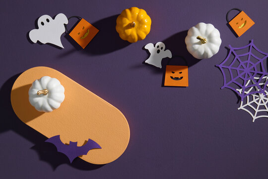 Halloween Decorations with Pumpkins, Ghosts, and Spider web