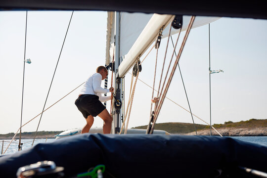 Man arranging the sails