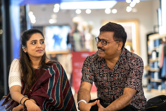 Middle aged Indian couple  interacting