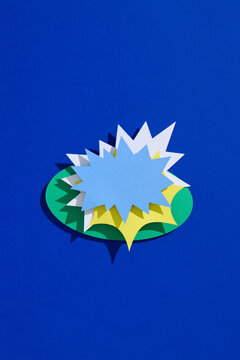 Abstract Paper Art With Bright Colors On Blue Background