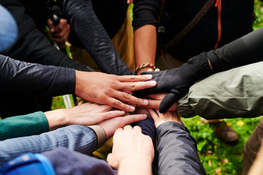 Group of people holding hands