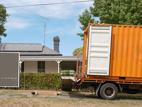 Moving truck ready to load outside home