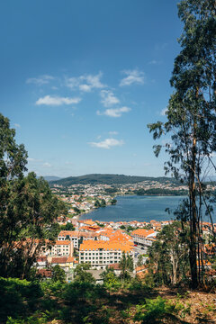 Scenic landscape view of Combarro with orange rooftops and blue waters