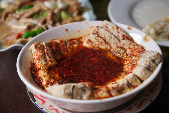 Closeup delicious food, spicy steamed stinky tofu